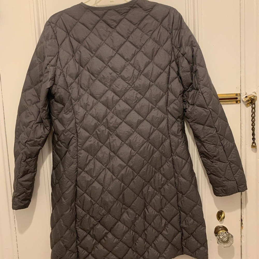 Uniqlo mid-length down jacket. Light weight with pockets.